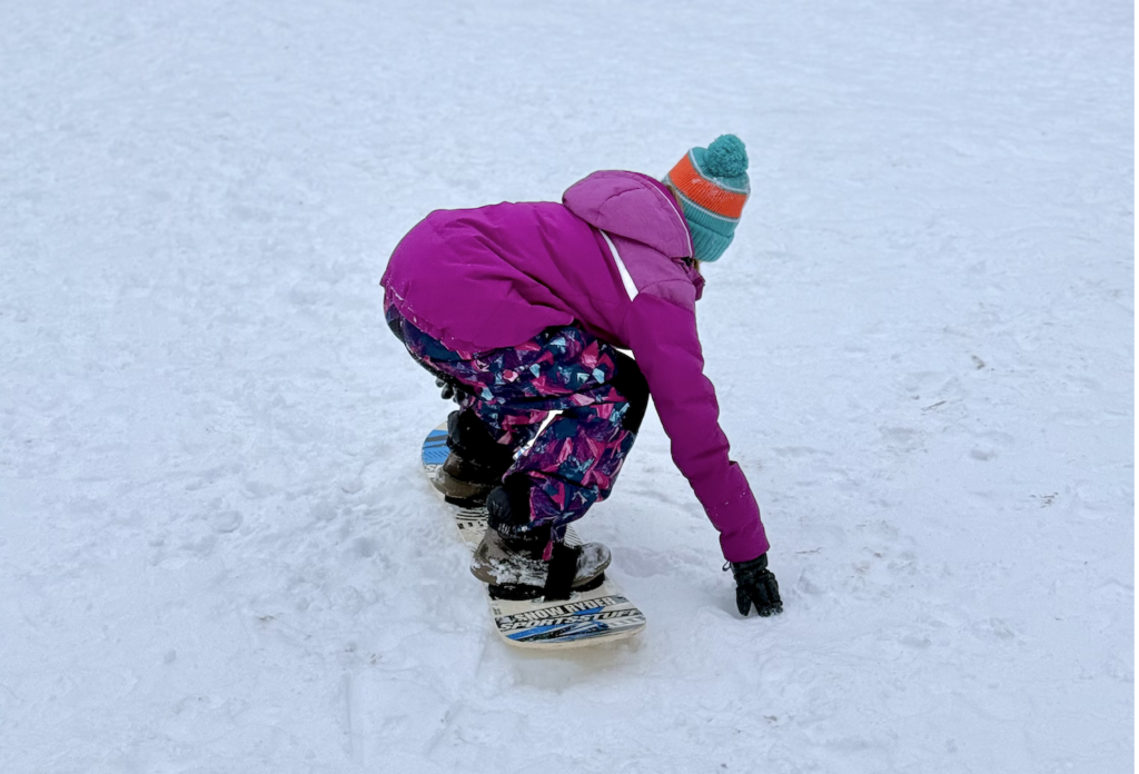 Girl snowboarding